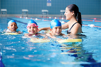 Water Safety Instructor teaching swim lessons