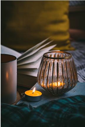 Cozy Candles with Open Book and Mug