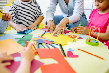 Children doing crafts with paper