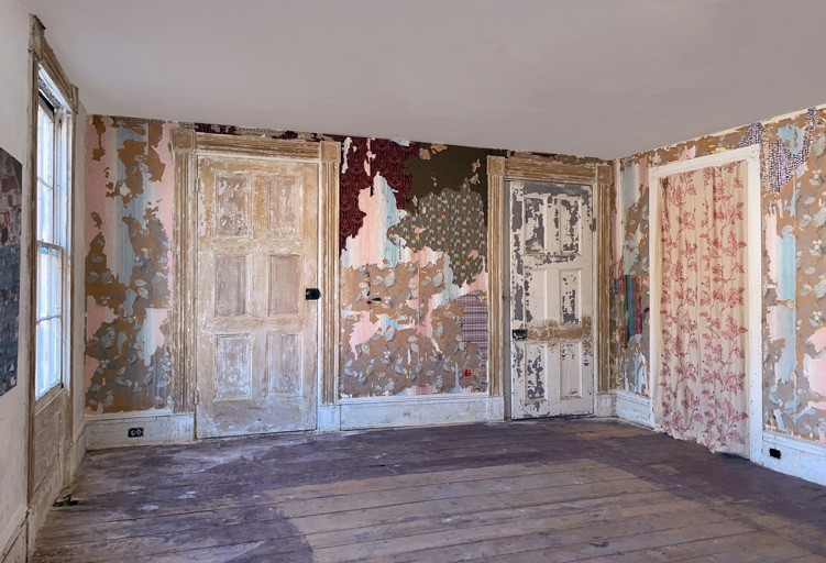 A room with peeling paint and doors AI-generated content may be incorrect.