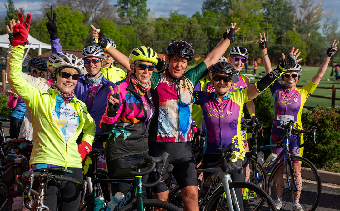 people at a bike race celebrating after their ride