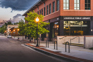 Photo of Louisville Public Library looking down Spruce Street
