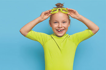 photo of little girl with googles