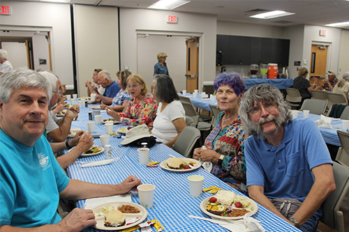 Photo of seniors at lunch