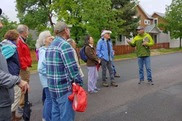 Crowd of people participating in a Museum Walking Tour
