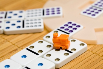 close up of mexican train domino game