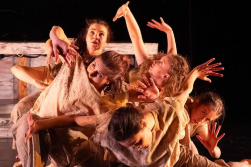 Group of dancers entangled