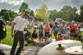 Band performing at a 2025 Summer Concerts in the Park event