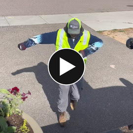A Parks team member dancing 