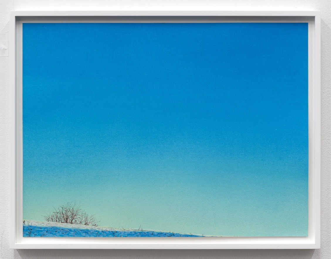 A blue sky above a snowy hill 
AI-generated content may be incorrect.