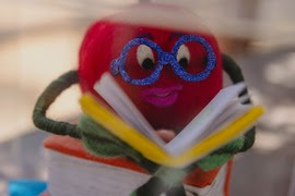 Close up of fiber tomato reading a book?