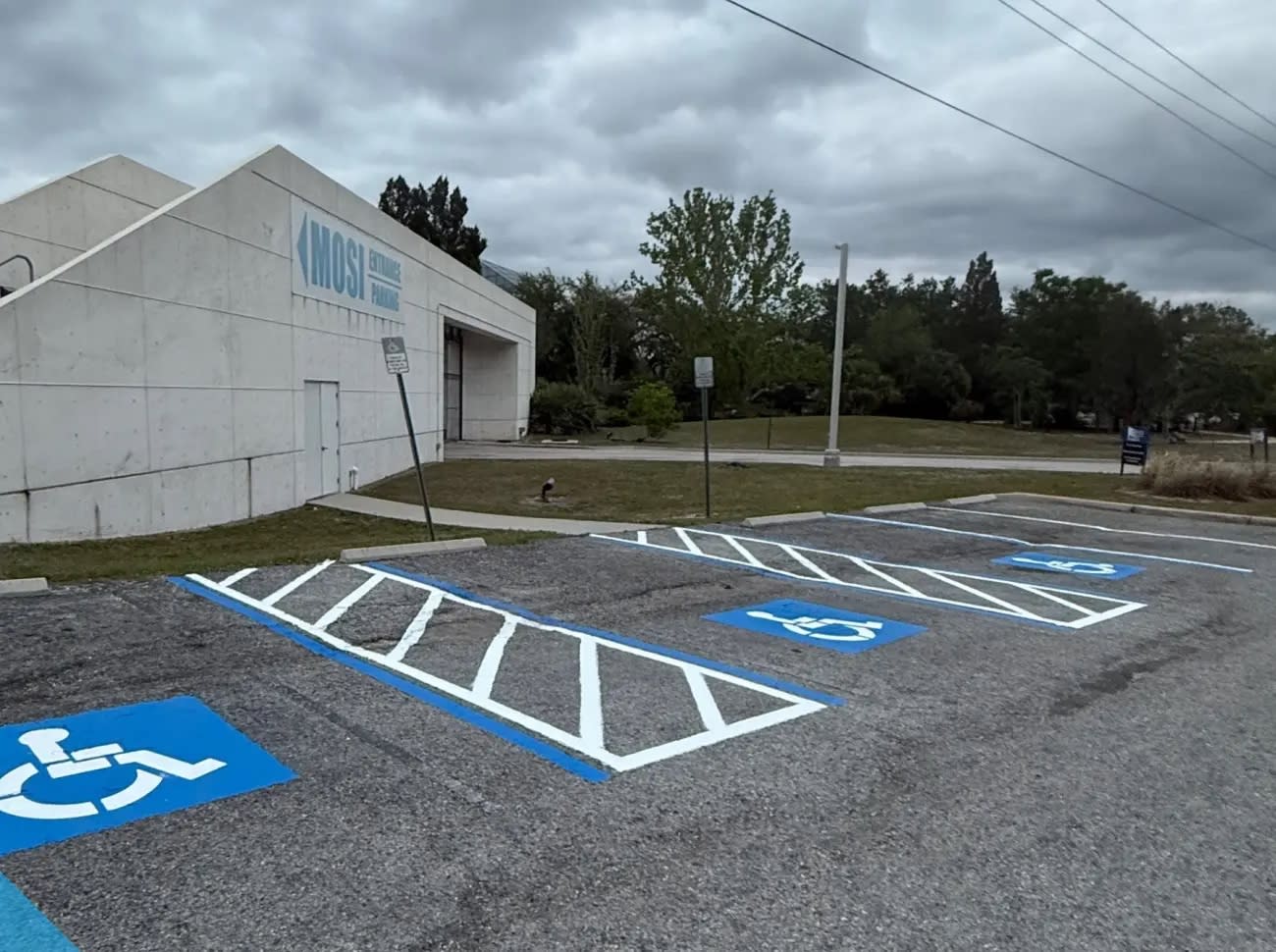 MOSI parking lot ADA accessible spaces freshly repainted by Radiant Striping, Museum of Science and Industry Tampa