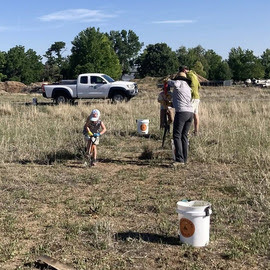 Volunteers pulling weeds 