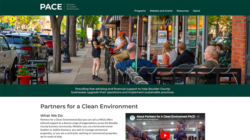 A screenshot from the PACE homepage which shows an image of downtown Longmont and text from the website. 