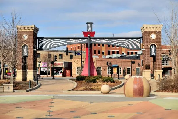 Festival Park in downtown Elgin, Illinois. The park is part of a renovated area along the Fox River in the old river city. Urban renewal is common among older American cities, often about waterfront areas.