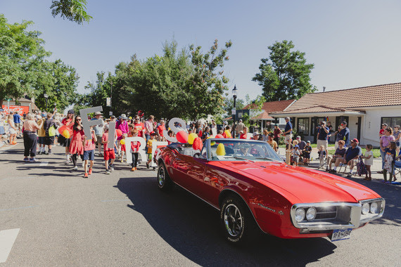 Red convertible in Labor Day Parade