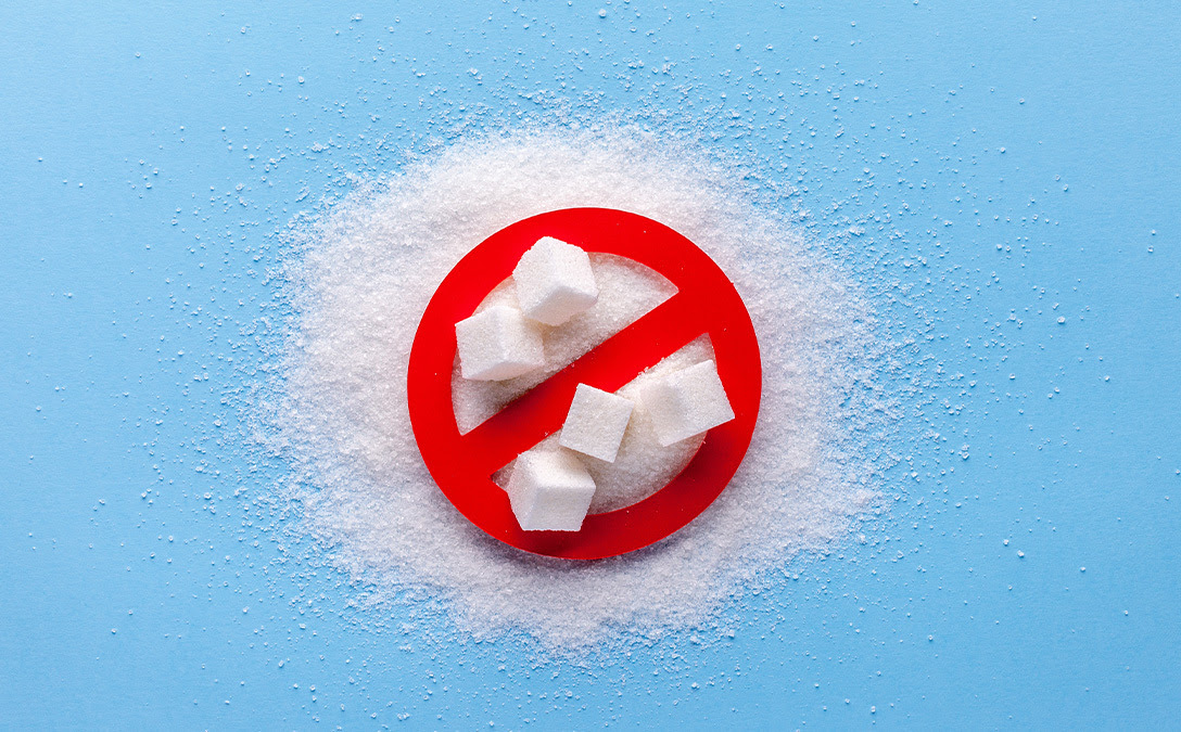 Red mark crossing out sugar cubes 
