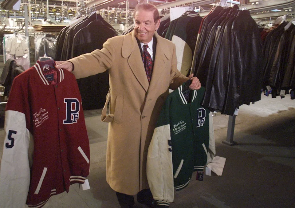 Monroe Milstein, who founded Burlington Coat Factory in 1972, is shown in a company warehouse in 2001.