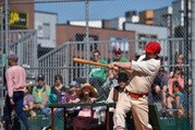 Baseball player swinging a bat at Louisville Vintage Base Ball Game