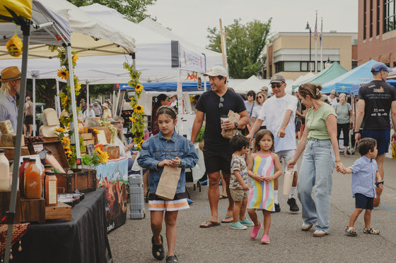 Family shopping at the Louisville Farmers Market