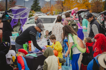 children dressed up in Halloween costumes at Trunk or Treat event