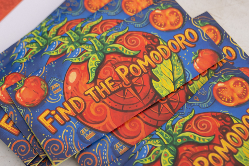 Find the Pomodoro brochures spread out on a table