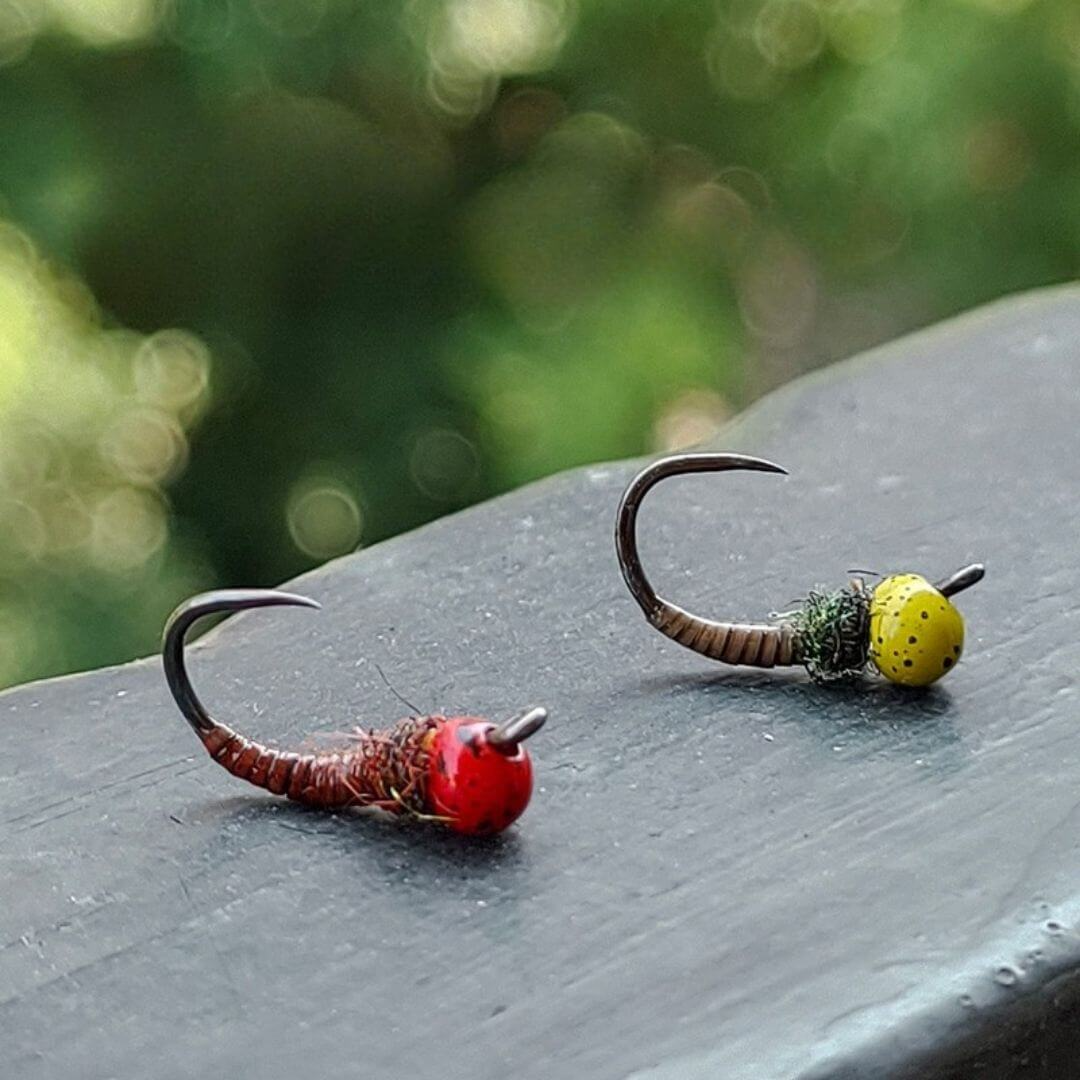 Rivfly Tungsten Frenchie nymphs with red and yellow collars on curved standard hooks