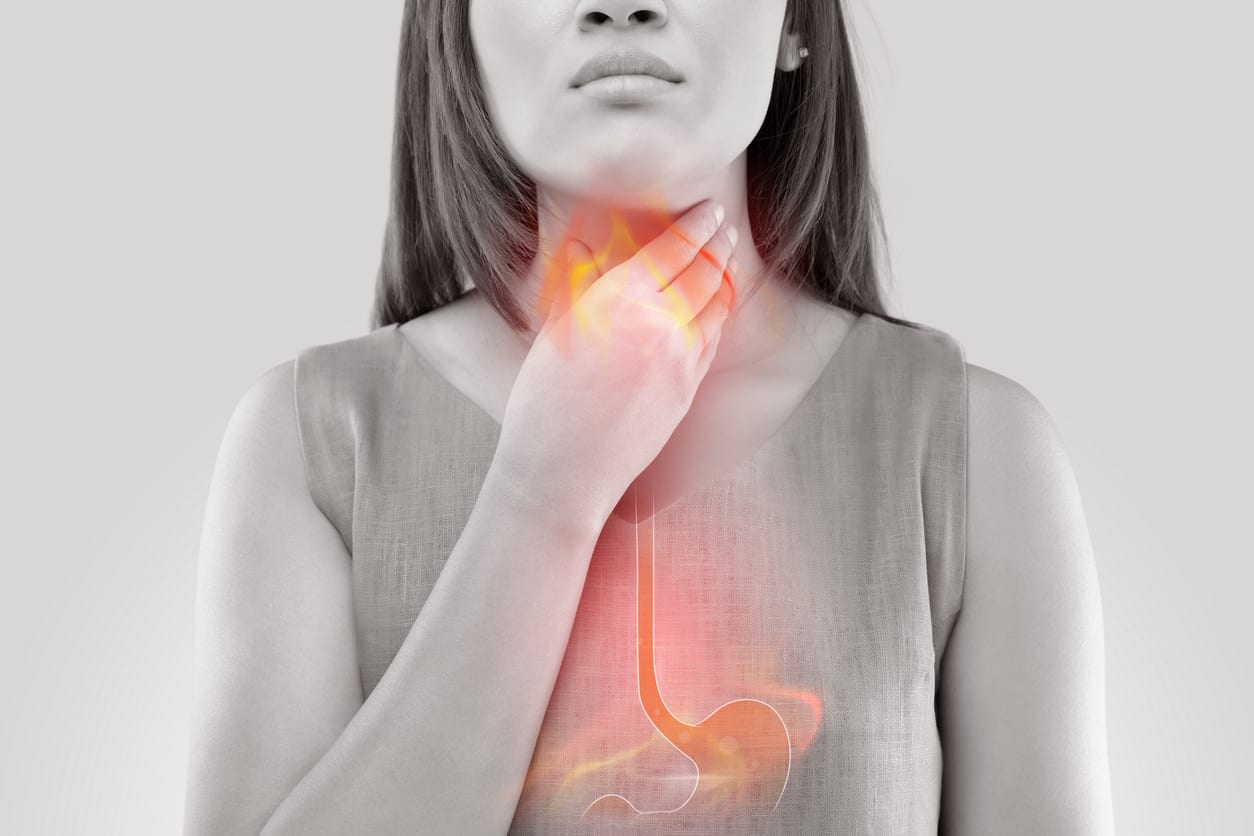 Women suffers from acid reflux.