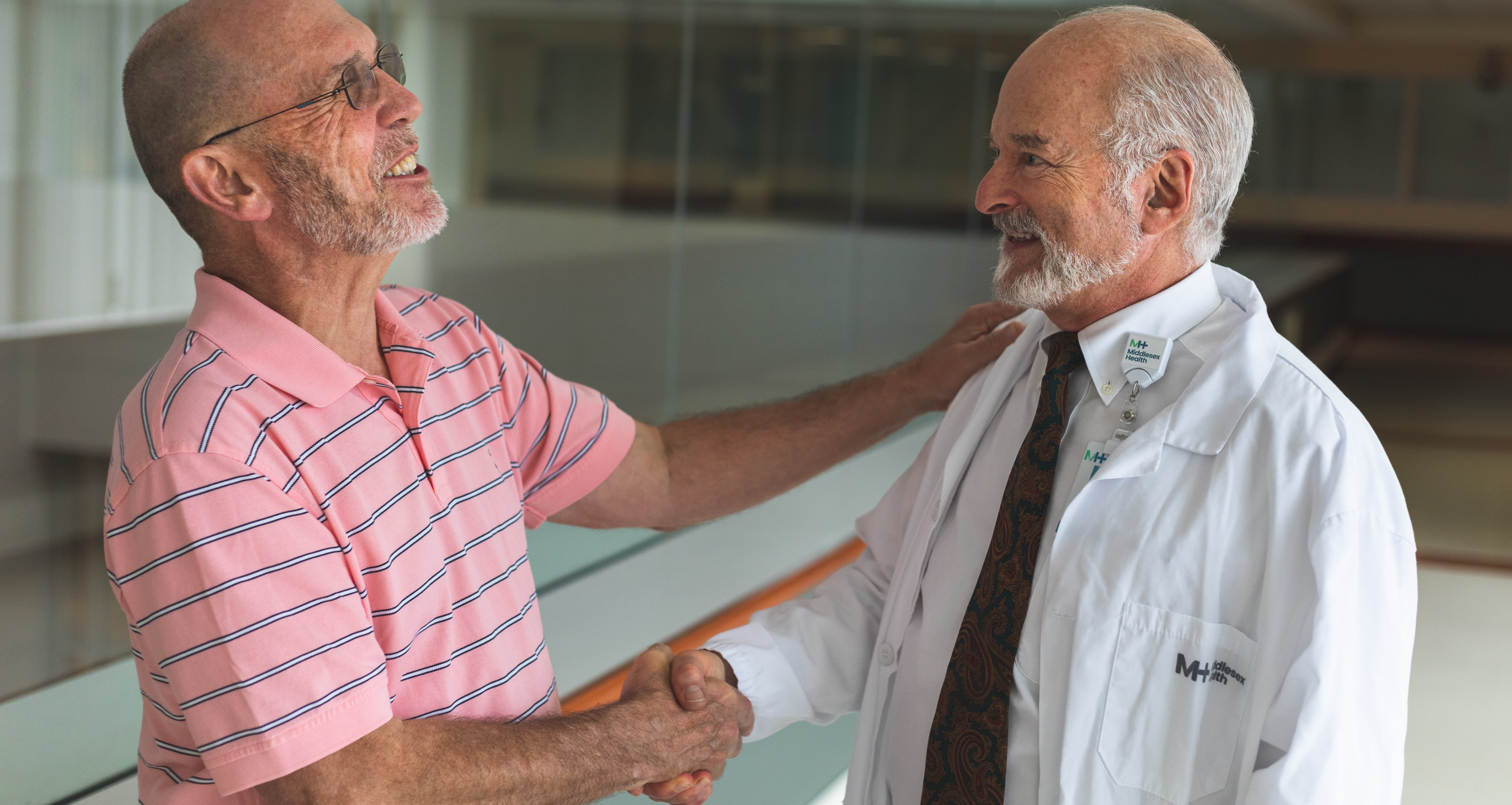 Lung cancer survivor Kirk Davis with radiologist Dr. Michael Crain.