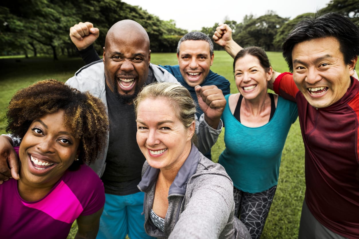 group outside and exercising together