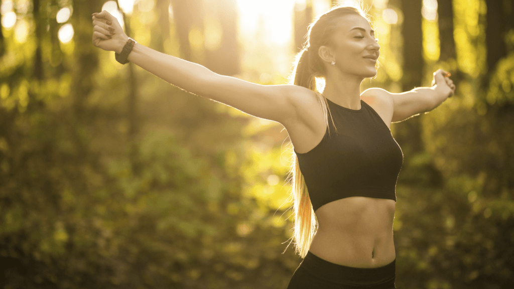 woman happy in the woods