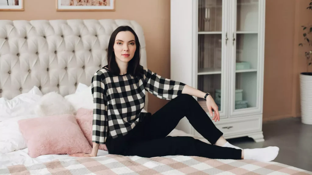 woman sitting in bed