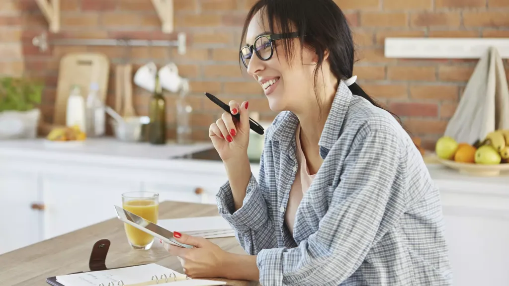 happy woman on desk
