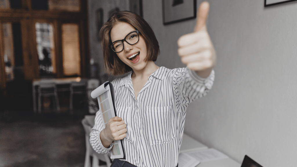 happy woman with thumbs up