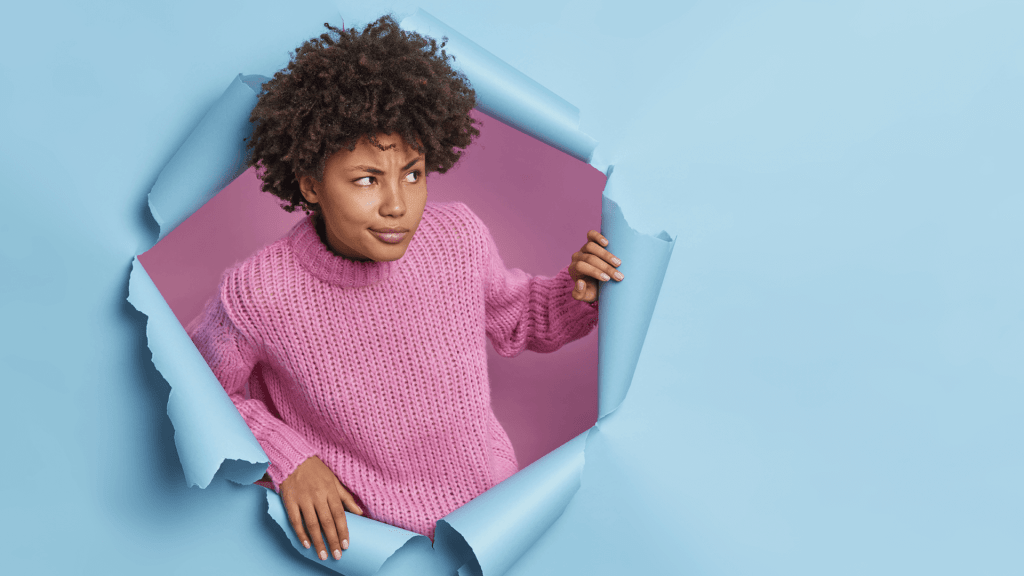 woman off cardboard wall