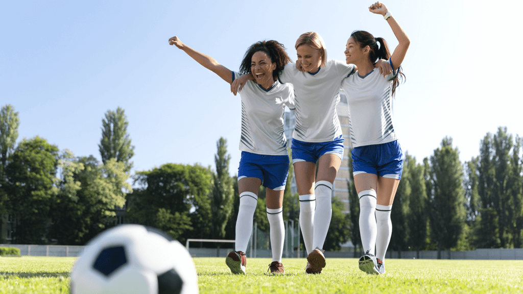 woman trio football