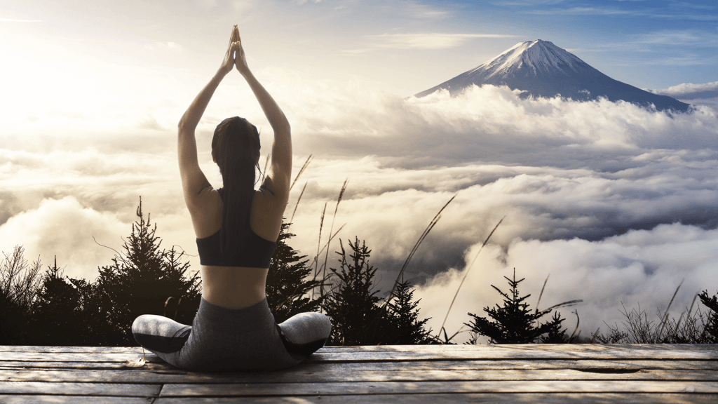 woman yoga mountain
