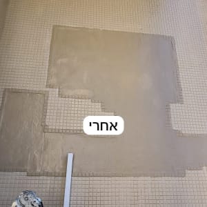 קיר עם תיקון טיח ולבנים