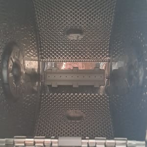 תוף מכונת כביסה עם חורים