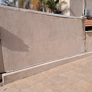 Electrical panel and conduit on a wall