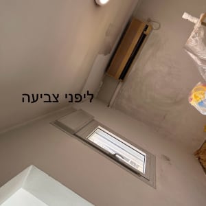 קיר עם סימני צבע לפני צביעה