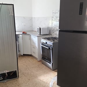 פינוי מקררים ומוצרי חשמל גדולים מפינת המטבח בדירה