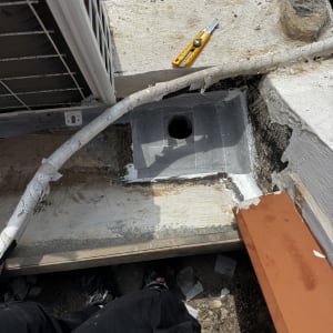 עבודת תיקון איטום מקומית סביב פתח ניקוז בגג באמצעות רשת חיזוק