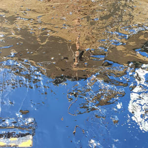 משטח אטום בזפת נוזלית מבריקה