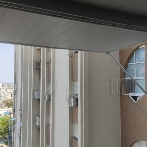 גגון אלומיניום עם תמיכה חיצונית