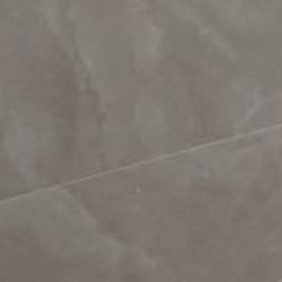 אריחי קרמיקה אפורים מותקנים על קיר