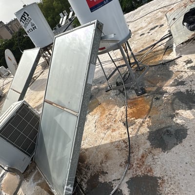 דוד שמש ומערכת חימום על גג