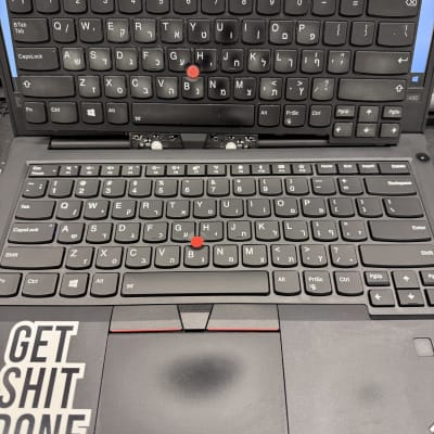 מקלדות מחשב נייד עם מקלדת חלופית מונחת מעל