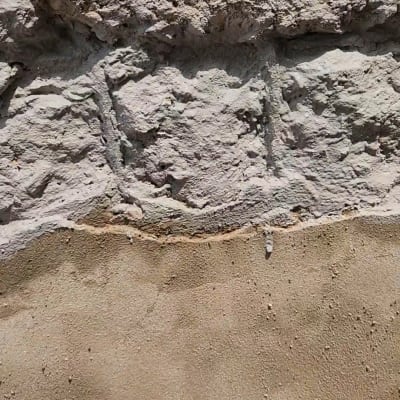 קיר עם טיח ובטון, מתאים לעבודות בגובה