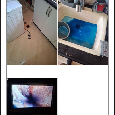 כיור עם מים כחולים, מכשיר על הרצפה, מסך עם תצוגת פנים צינור